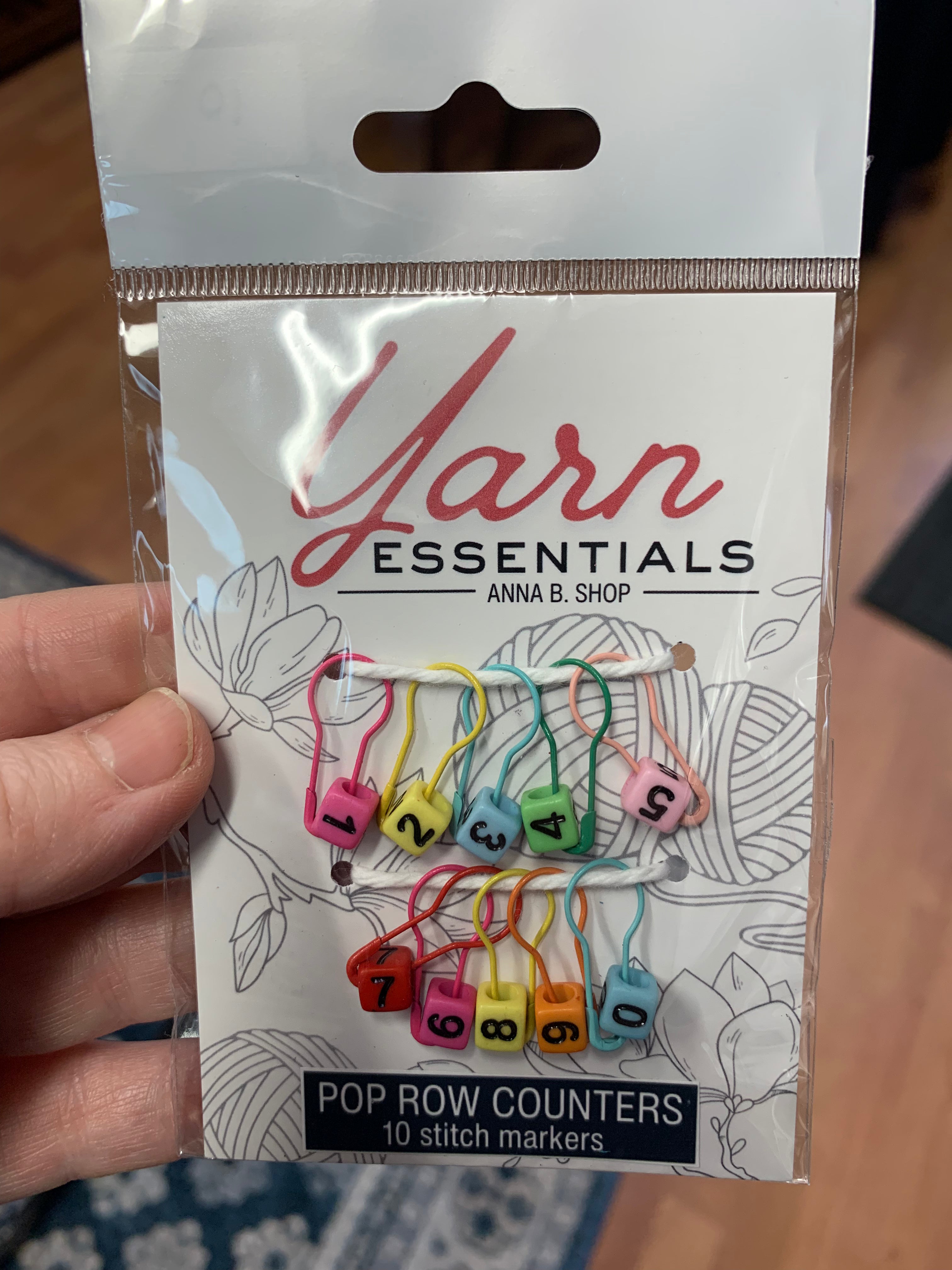 Stitch marker pop row counters